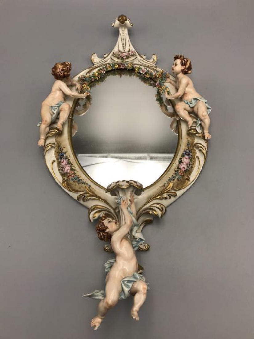 Capodimonte wall mirror candle sconce: Size is 19 inches in length. Do not see any damage on it.