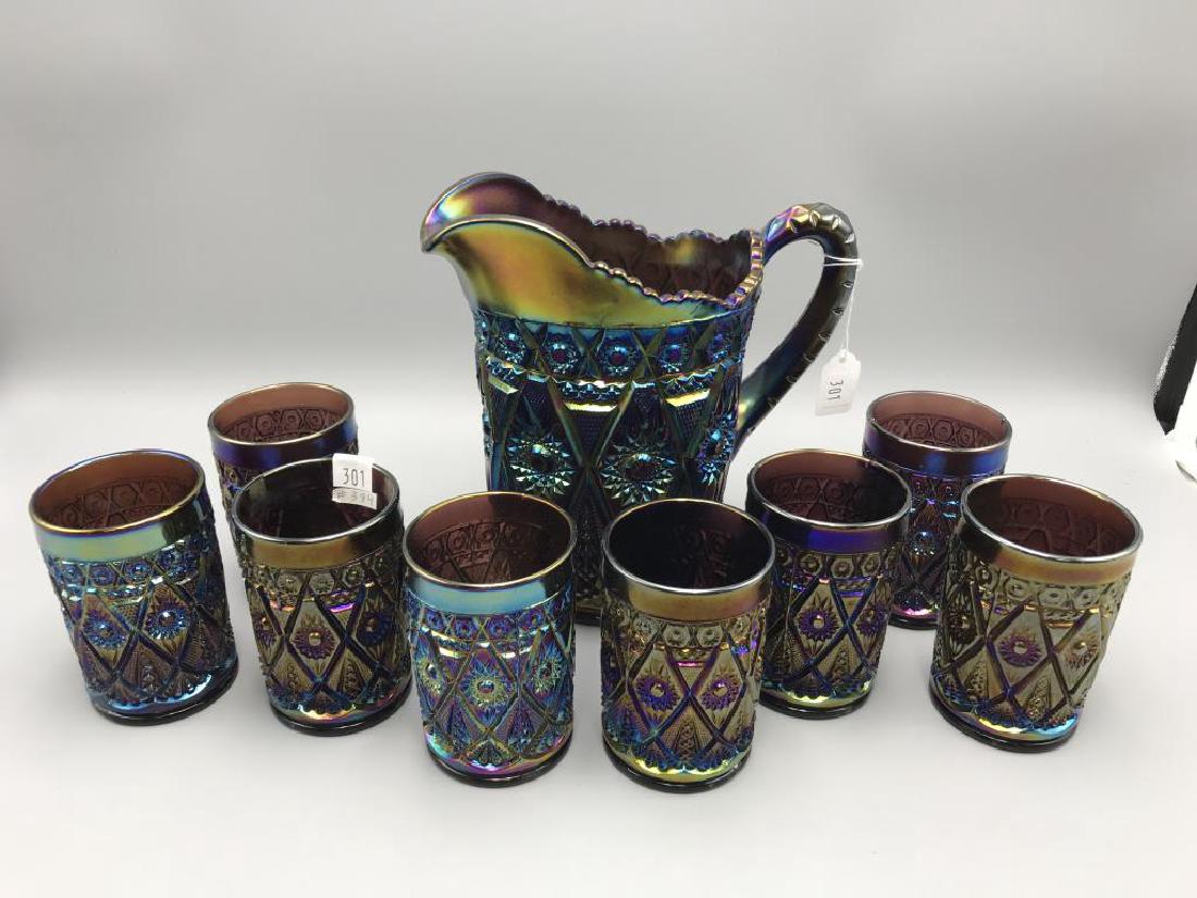 Amethyst carnival glass  water set; (1 of 4)