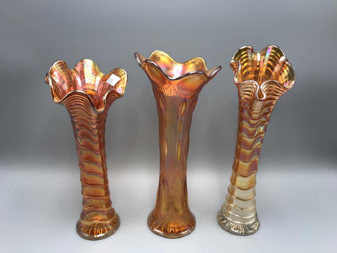 Lot 3 carnival glass vases: 11 1/2 inch tall marigold vases, rib with bead chain pattern, 11 1/2 inch marigold vase, ripple pattern, 12 inch marigold drapery pattern