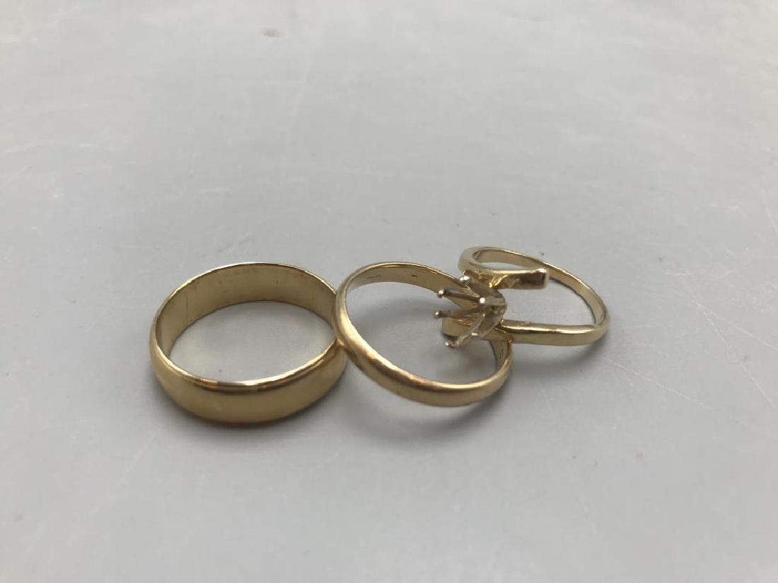 Lot of three gold rings; 14 k manâ€™s wedding (1 of 2)