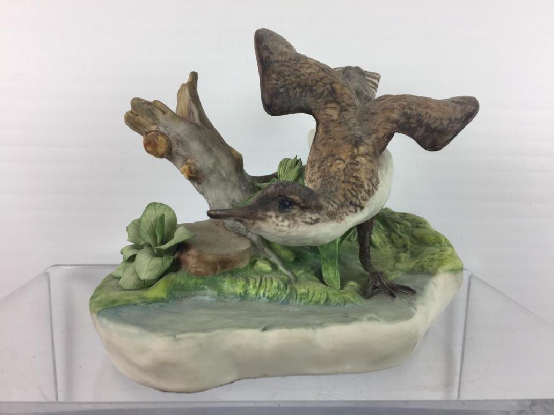 Cybis porcelain figure of a bird: number 253, 5 inches tall by 7 inches long