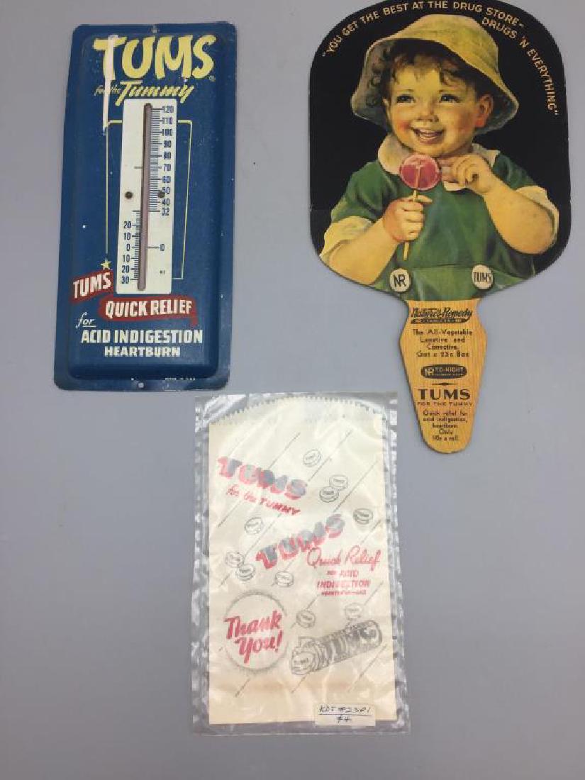 Tums tin advertising thermometer and fan (1 of 7)