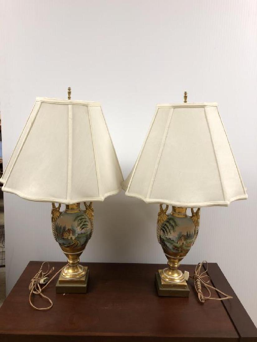 Pair hand painted table lamps with Tuscan: landscape scenes, gilt swan handles, lamps stand 28 inches to the finial, Urn shaped base are 15 inches tall