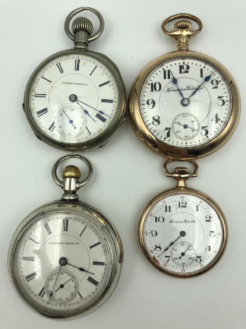 Lot of 4 Hampden open faced pocket watches: includes Coin silver 2.5 inch diameter #479073, circa 1887-running, 2 inch engraved case #2529409 circa 1908, 2 inch Argentine Silver engraved case #383822 circa 1885, 1.5 inch engraved case #2979502 