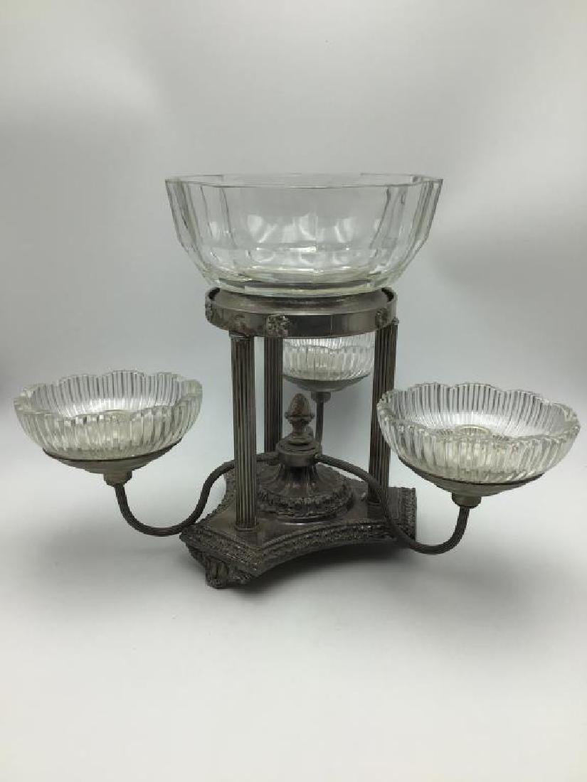 Silverplate Epergne: three arm base with removable clear glass candleholders, large clear bowl sits on top, size including bowl is 13 inches tall by 19 inches diameter