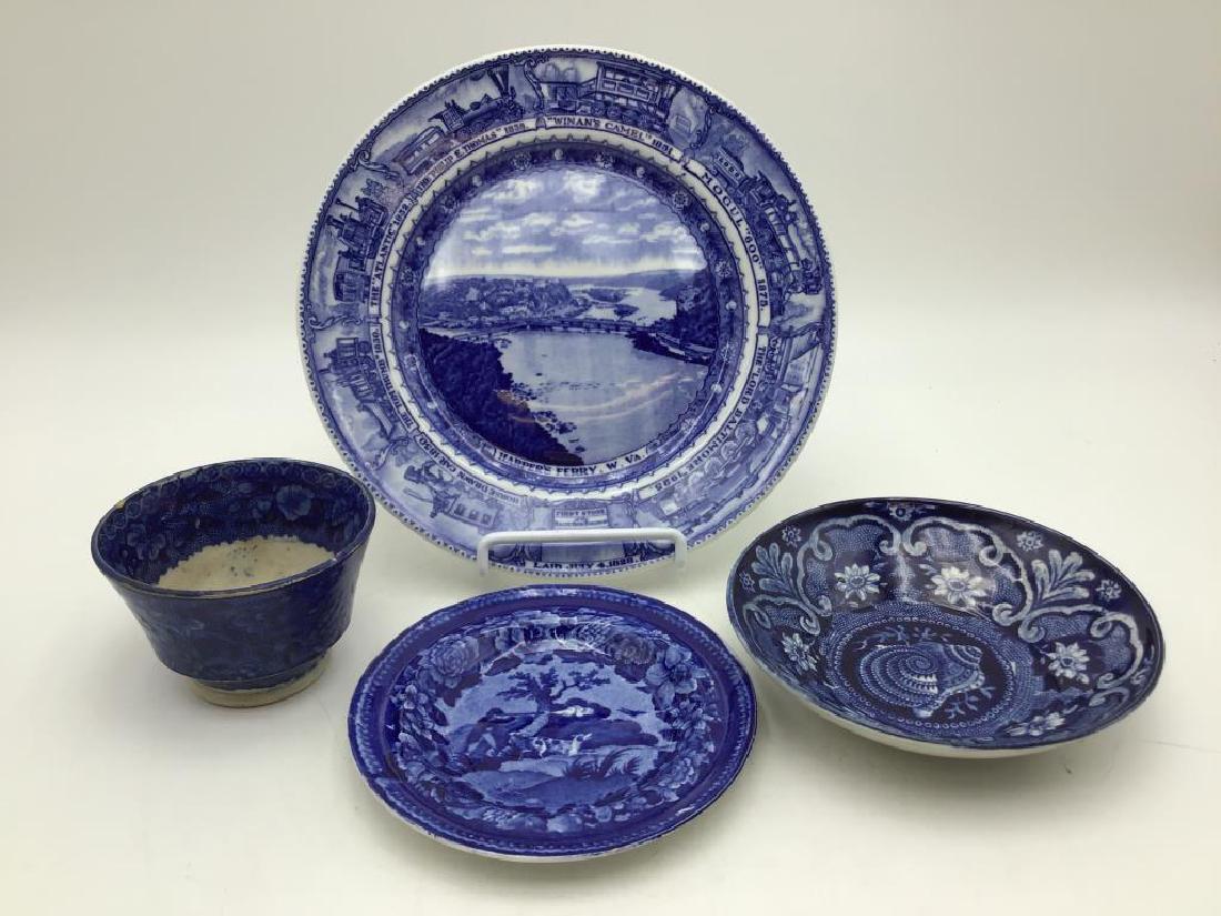 Historical China Lot: Includes four pieces of historical blue and white china. A Lamberton plate featuring the Baltimore & Ohio Railroad, a dish with seashell motif bottom impressed "Joseph Stubbs Longport." Third is an un