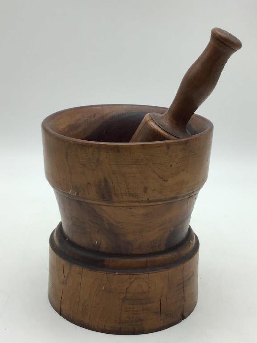 Early Wood Mortar & Pestle: heavy wood mortar and pestle, bowl measures about 7 inches high with 6 inch diameter across top.