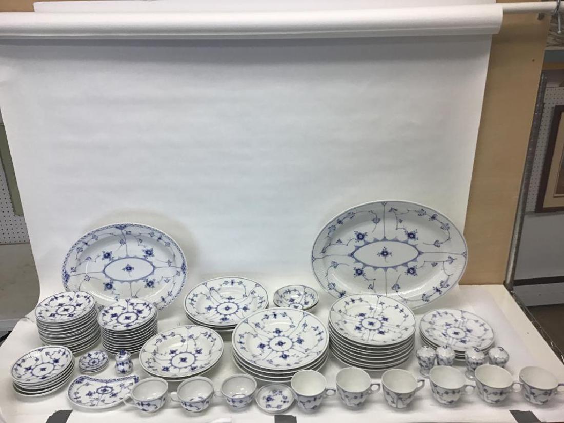 Royal Copenhagen china service: Royal Copenhagen in Blue Fluted Full Lace pattern, 76 pieces total, sells as is, consists of 7 large dinner plates 10 inches diameter, 9 medium 9 inches plates, 4 small plates 7.5 inches, 2 soup bowls