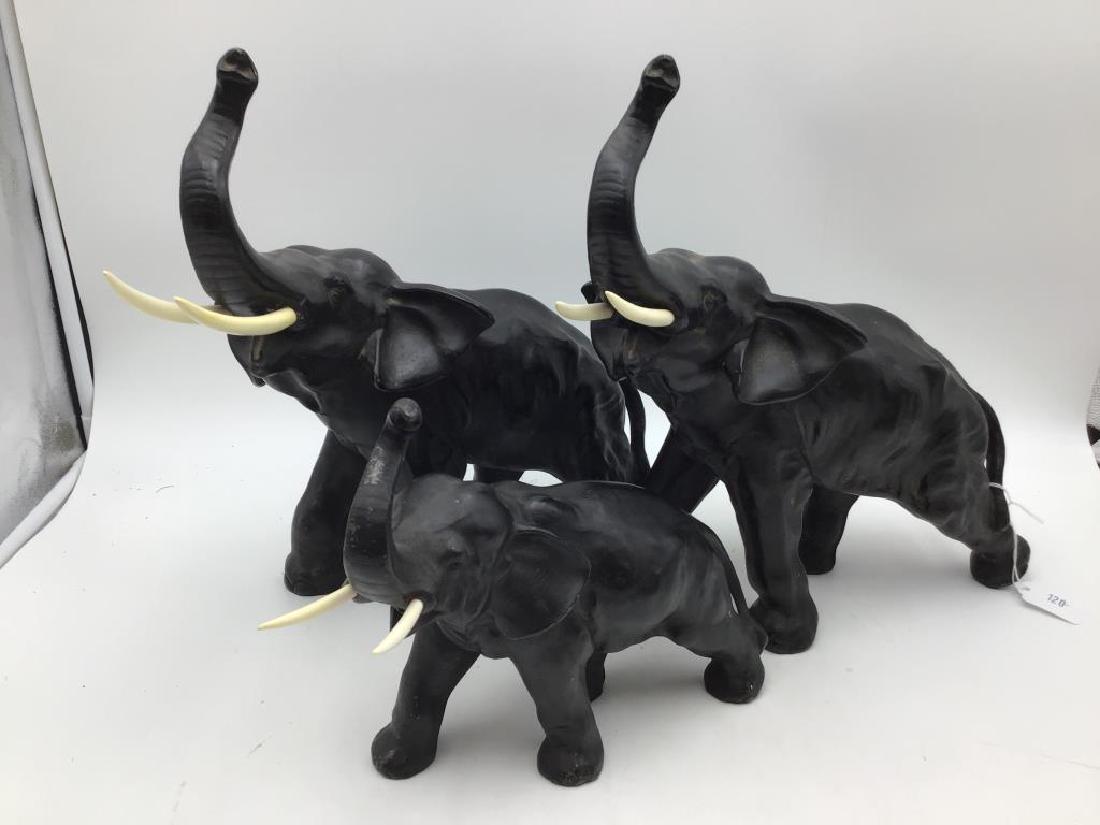 Set of three graduated size metal elephants (1 of 8)