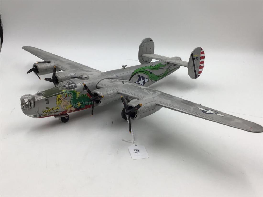 Franklin Mint B24 Liberator: 27.5 inch wing span, no box, no paperwork, missing prop some gun barrels are bent. Provenance: From the Estate of Raymond Bentley.