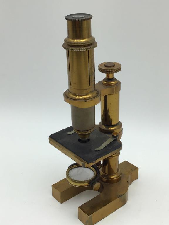 Brass Microscope: Measures approximately 9.75 inches tall by 3 inches wide by 4 1/2 inches deep. Scratches on top, from the Raymond Bentley Estate.