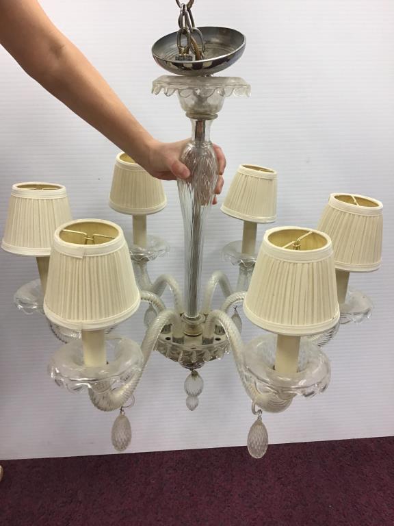 Venetian Glass Chandelier: Venetian glass chandelier with six lights at ends of twisted glass arms, mini hats/shades. Good condition, electric not tested, measures about 26 inches tall from metal mount to bottom, by 22 inches w