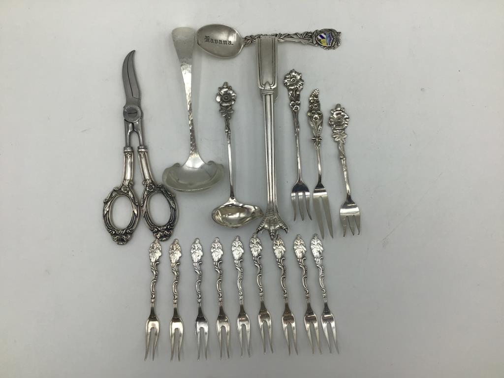 Sterling and Mixed Serving Utensils: Lot of 17 items, includes 9 two-prong forks marked SWEDEN, four floral handles marked REED & BARTON, "L Sterling 365" talon ice tongs, marked sterling Havana souvinere spoon, Stalinless Italy scissors