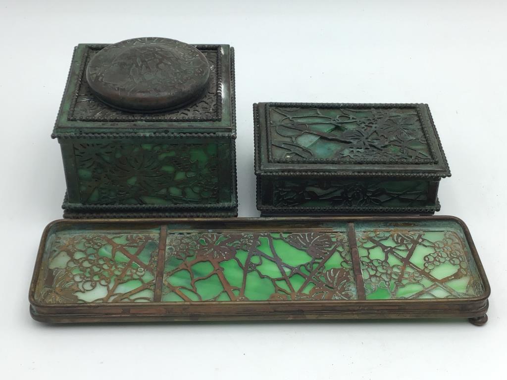 Tiffany Studio Desk Collection of three: Etched metal and Green slag glass in Grapevine pattern marked by Tiffany Studios New York, includes three items total-- inkwell with glass insert, cigarrette box, pen tray, Used condition, interior to
