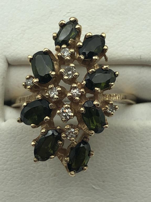 10K Green and Diamond Stoned Ring: 8 - 5 x 3 Green (Tourmaline?) stones, 6 diamond chips, 10K, ring size 9, 3.3 dwt.