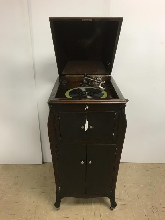 Victor VV-XI Talking Machine Vertical: Nice condition and plays well, 78 RPM. Chrome on arm, hinges and needle cup in good condition. Measures 20 inches wide x 21 1/8 inch deep x 44 inches high.