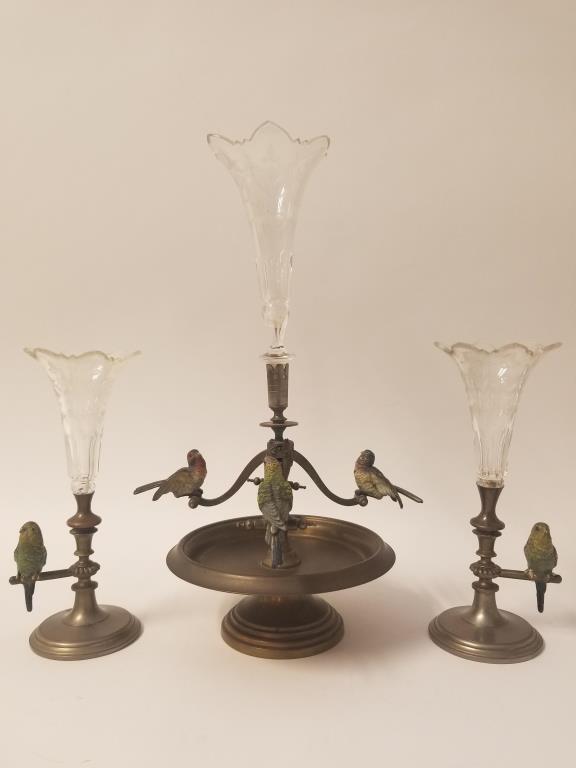 Vienna bronze birds Epergne and 2 side vases: 4 balancing birds on bronze center epergne and 2 matching side vases. Cut glass vases, side vases have some edge chips. Center piece is 14 inches tall.