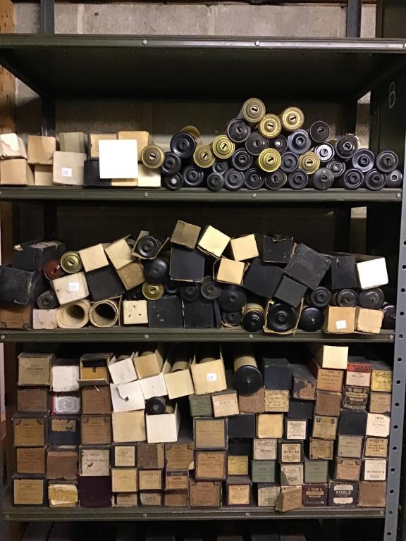 Shelving section of miscellaneous piano rools: 4 shelves of miscellaneous Polster piano rolls, over 200 This item is NOT at Tom Hall Auction gallery.Due to size and logistics this item will remain at Musical Memories Museum located at 1010 Jeffers