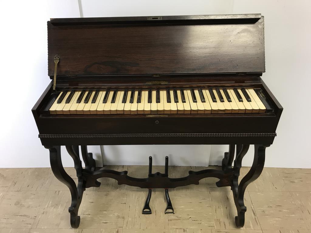 George Prince Rosewood Portable Melodeon: With detailed trim molding, patent date 1846, #29775, Cabinet in nice condition, Bellows etc. need rebuilding. Small section of molding is missing.