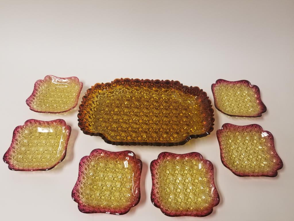 7 piece Amberina Ice Cream set: Large platter is darker and measures 14" x 9". 6 small 6" x 6" dishes. There are a few edge chips.