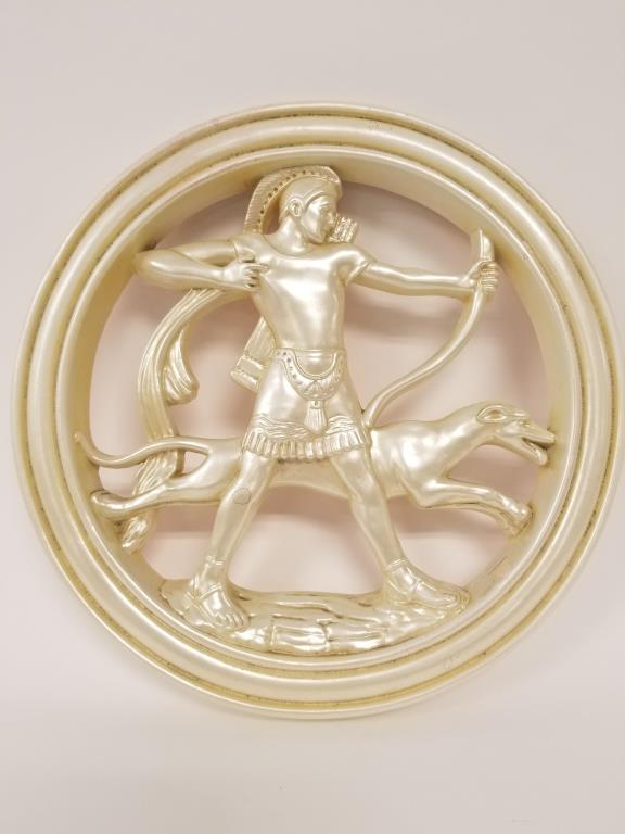 Art Deco plaque of archer and greyhound: House of David vintage ceramic plaque of an archer and greyhound, with a white pearl finish.