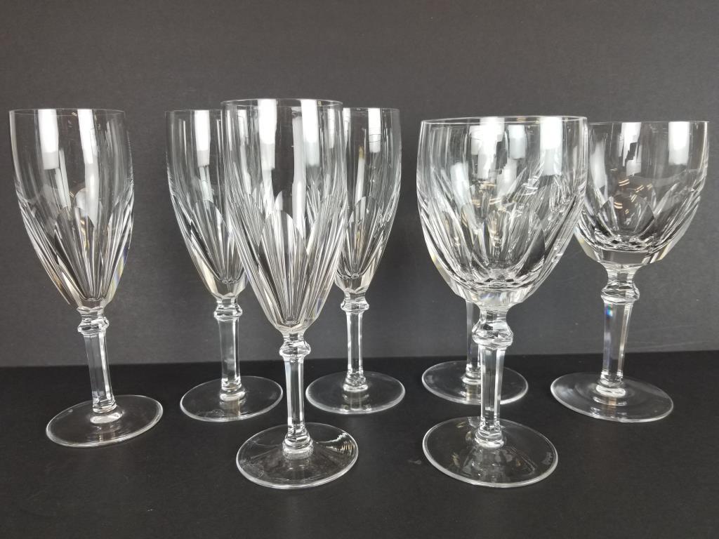 7 Waterford Crystal champagne wine glasses: Four Waterford 7 1/4 inch champagne glasses and three 7 inch wine glasses, in Dunloe pattern.