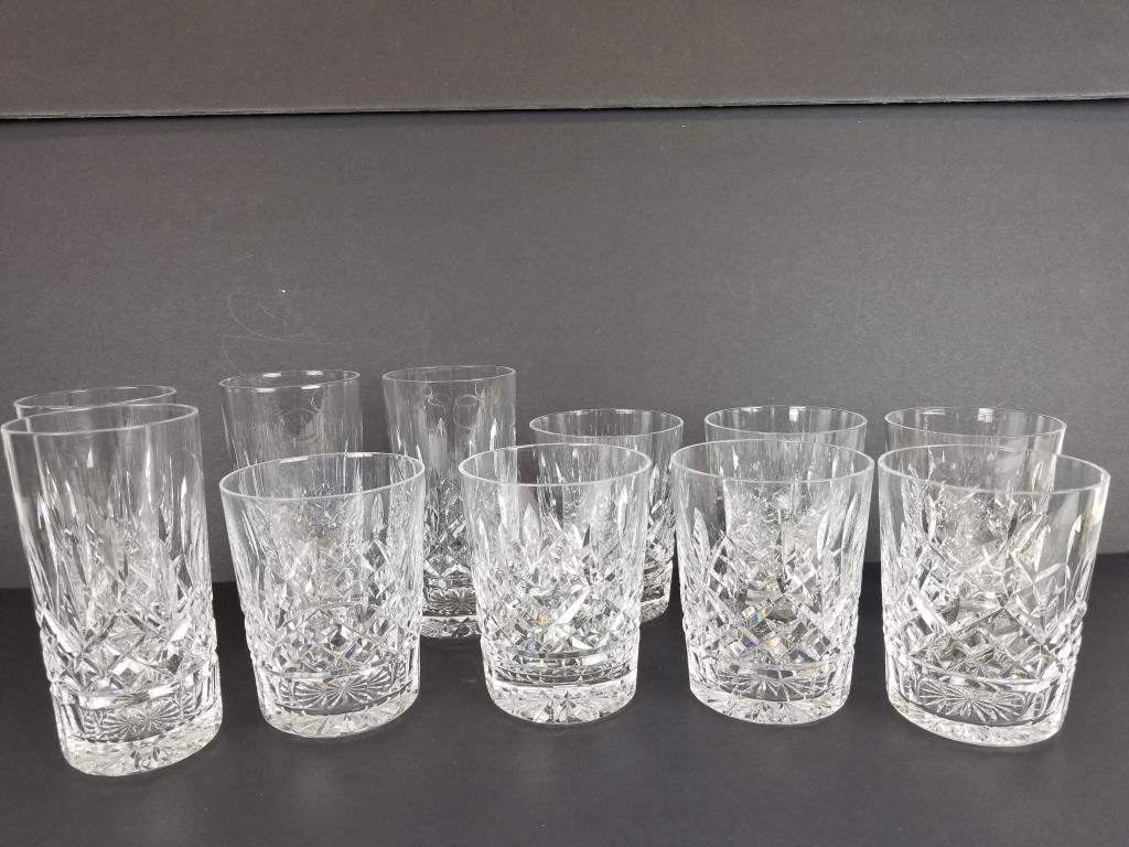 11 Waterford Crystal glasses: 7 double old fashioned 4 1/4 inch glasses and 4 highball 5 1/2 inch glasses. All in Lismore pattern. 2 glasses have an edge chip.