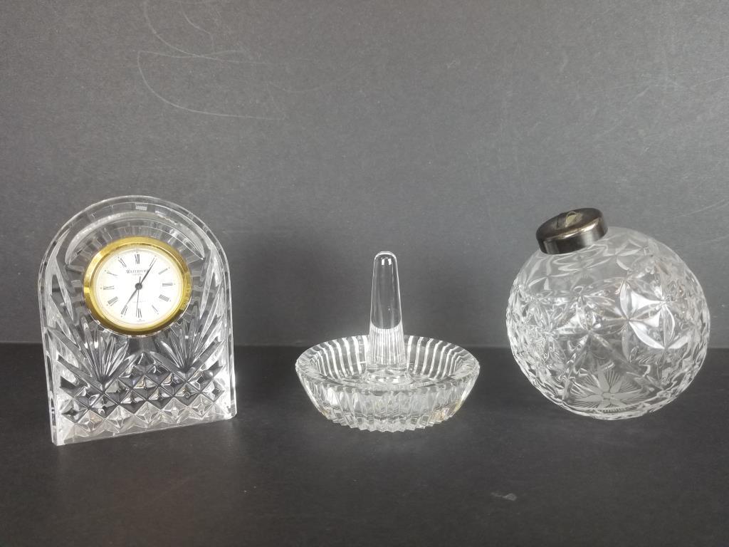 Waterford Crystal accents: Waterford Crystal clock measures 3 1/2 inches tall. Waterford ring holder and ornament.