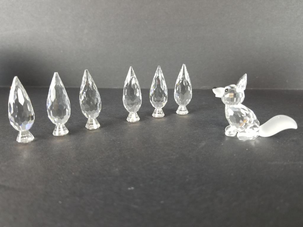 Swarovski crystal fox and poplar trees: 2 sets of 3 Swarovski silver crystal, city poplar trees. Also a miniature fox figure, he measures 1 1/4 inches tall. They come with their original boxes.