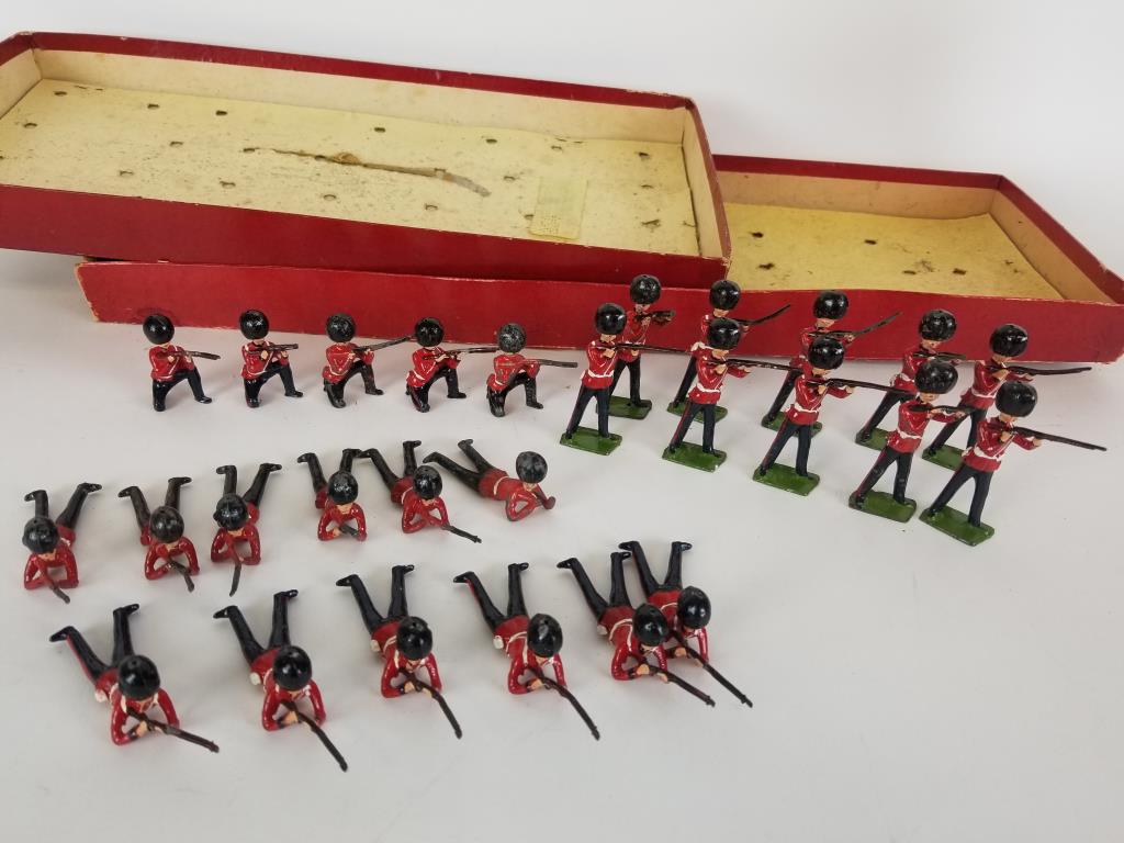 Britians Grenadier Guard lead soldiers: Lot of 27 Grenadier Guards Firing, 3 Positions. Lead soldiers. In various conditions, some have paint loss, bent or broken rifles. Each approx. 2-3 inches in size.