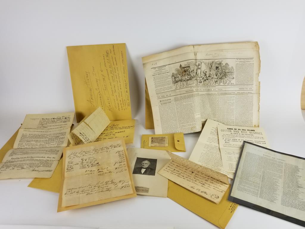 Lot of 1800s Slavery related papers: Sale of property and slaves papers, newspaper ads for slave sales and runaway slaves. Paper about Kansas Territory in 1836, Oct 1852 edition of The Liberator newspaper.