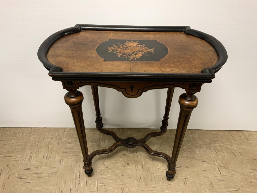 Burled mahogany inlaid table: Tray inlaid top, sits on tapered reeded legs. Measures 30 inches tall by 30 inches long by 18 inches deep. Top frame needs to be glued.