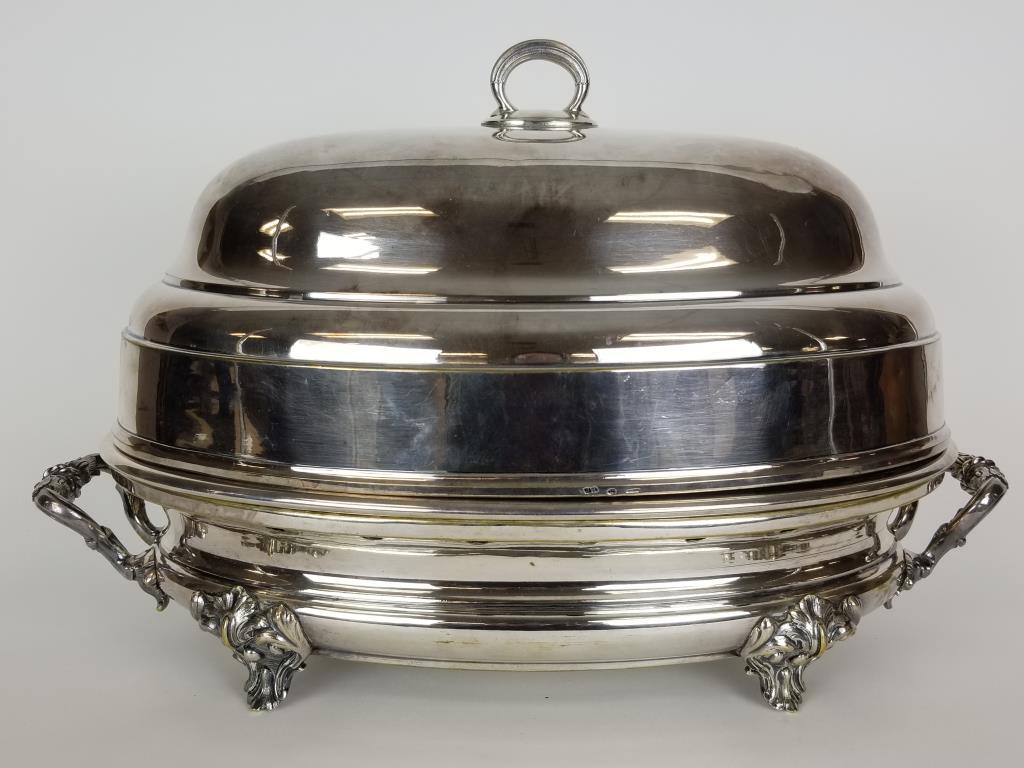 Christofle covered warmer tray: Warming tray with cover. Touch marked Christofle on all 3 pieces. Measures 18 inches wide x 12 inches high x 10 inches deep. Several small dents on tray and cover and wear to the base.