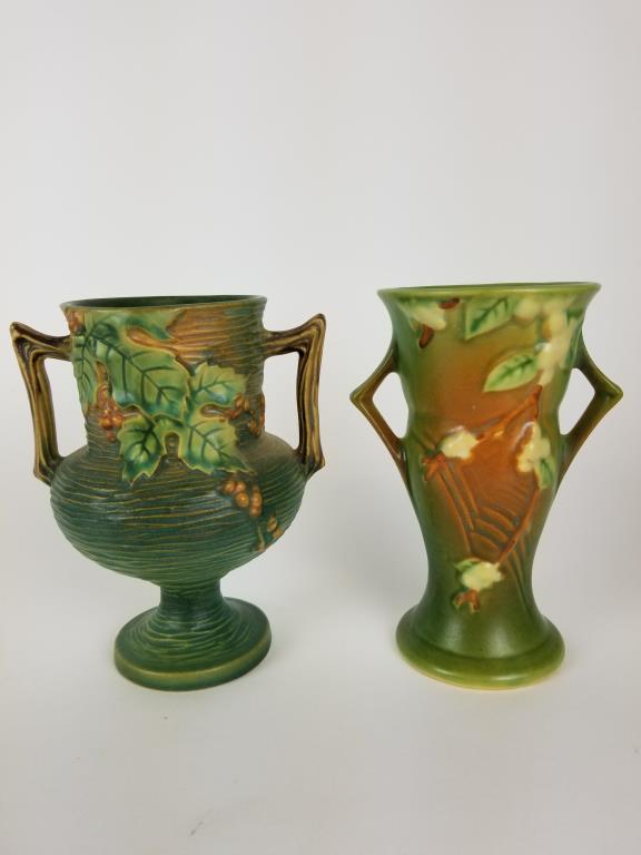 Roseville Bushberry & Snowberry vases: Roseville #156 - 6 inches tall trophy vase in Bushberry pattern. #1V - 6 inches tall handled vase in Snowberry pattern, and handle has been repaired.