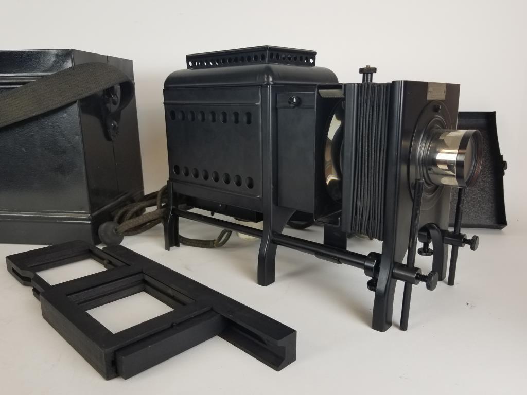 Bausch & Lomb Balopticon Slide Projector: Balopticon slide projector with case. Case measures 15 inches x 7 inches x 10 inches.