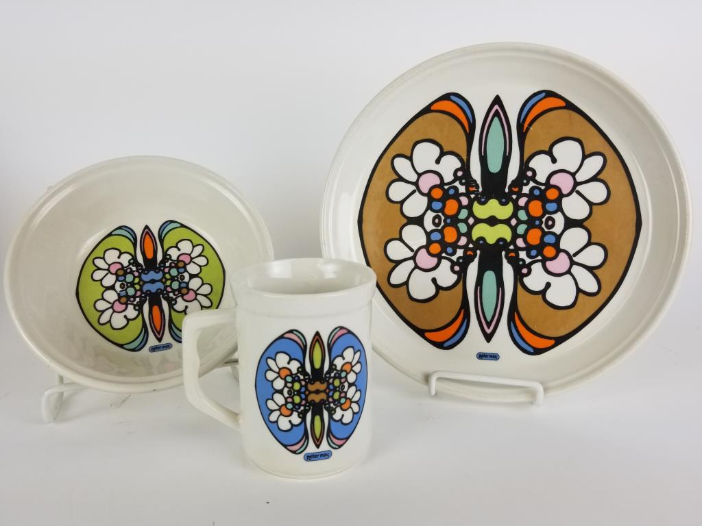 1960s Peter Max Iroquois China Butterfly dishes: Iroquois China, Peter Max psychedelic Butterfly pattern. Plate, bowl and coffee mug. Plate measures 10 inches in diameter. Bowl and plate have some scratches. Mug has the design on both sides.