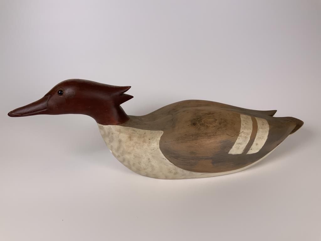 Bill Sheckler 1993 carved duck decoy: red headed duck, glass eyes, 5 inches tall x 15.5 inches long x 5 inches wide, signed and dated