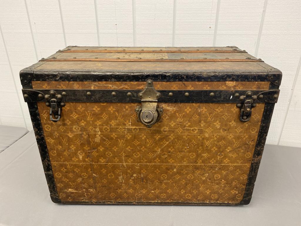Circa 1890's Louis Vuitton travel trunk: Rare (Circa 1890’s) double handled, original Louis Vuitton interior label and John Wanamaker paper interior label, wooden slats in tact, trunk has lots of wear from heavy use, lock is twisted, s