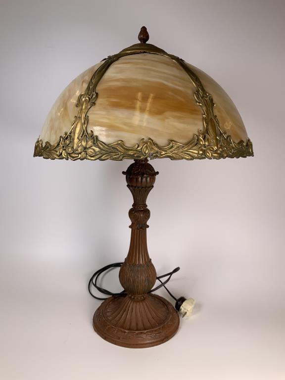 Salem Bros. Antique slag glass table lamp: six panel slag glass shade, Signed with sailing ship symbol on lamp base, 23 inches tall, lampshade is 16 inches diameter.