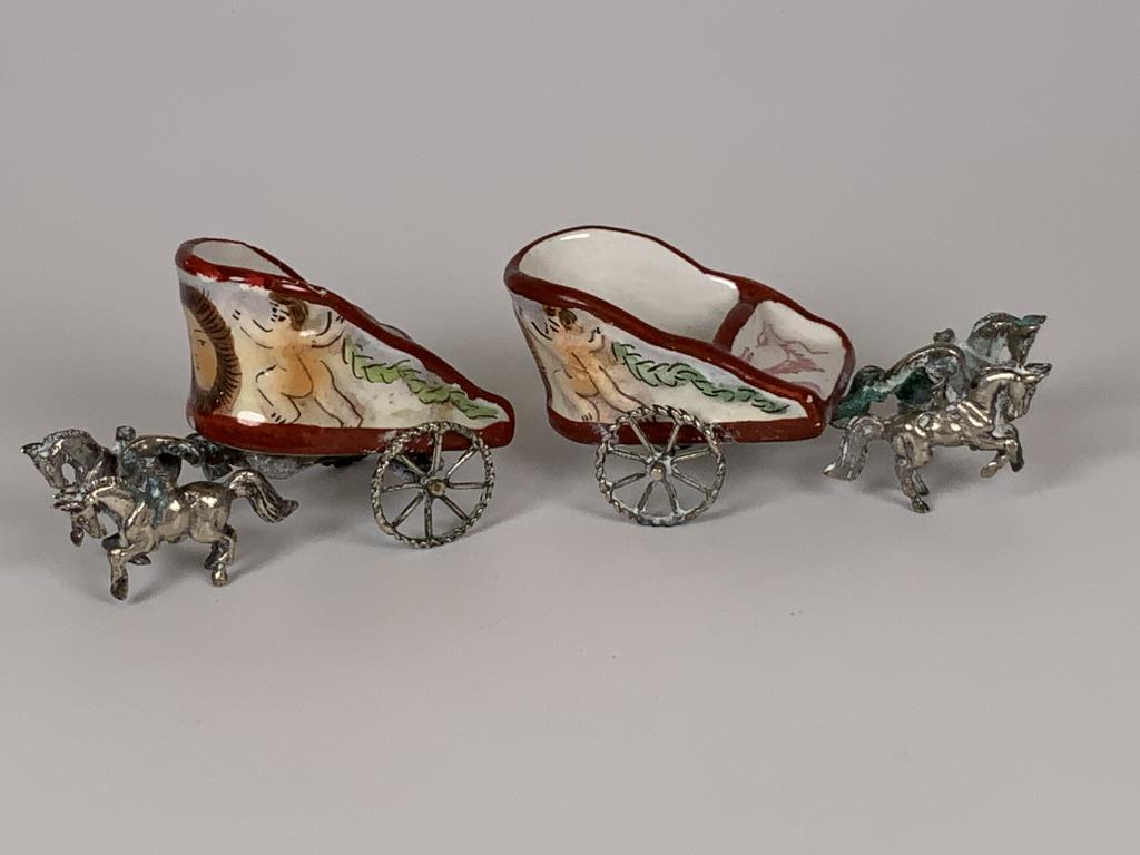 Miniature sterling & porcelain salt cellars: horse drawn chariot salt cellars, 1.25 - 1.5 inches tall, 2.75 - 3 inches long. ne has damage and repair to porcelain - see photos.