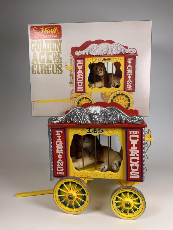 Steiff Golden Age of the Circus lion wagon car: with C. .A.,Steiff circus wagon car with Leo the Lion, train car is 10.25 inches tall, 9 inches wide, 5.25 inches deep, piece of trim has come off but can be glued back on, one hook missing from hitch