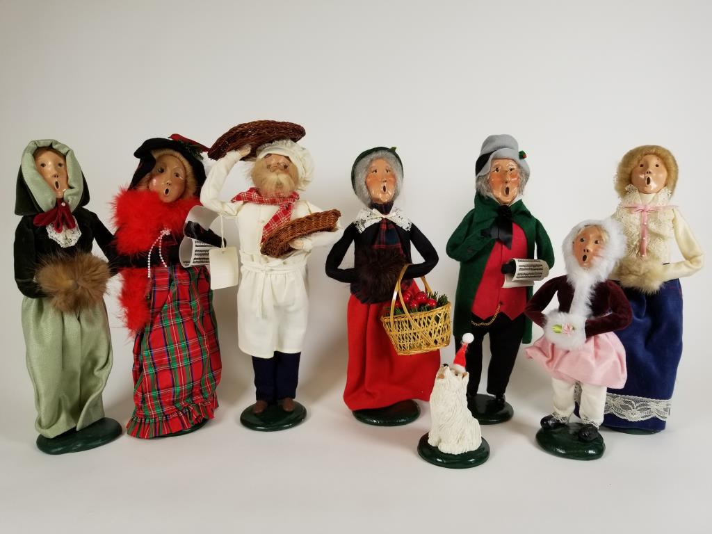 8 Byers Choice Carolers: Eight 1980-90s Byers Choice Carolers, the Baker, a man, 4 women, girl and a white dog. Adults measure approx. 14 inches tall.