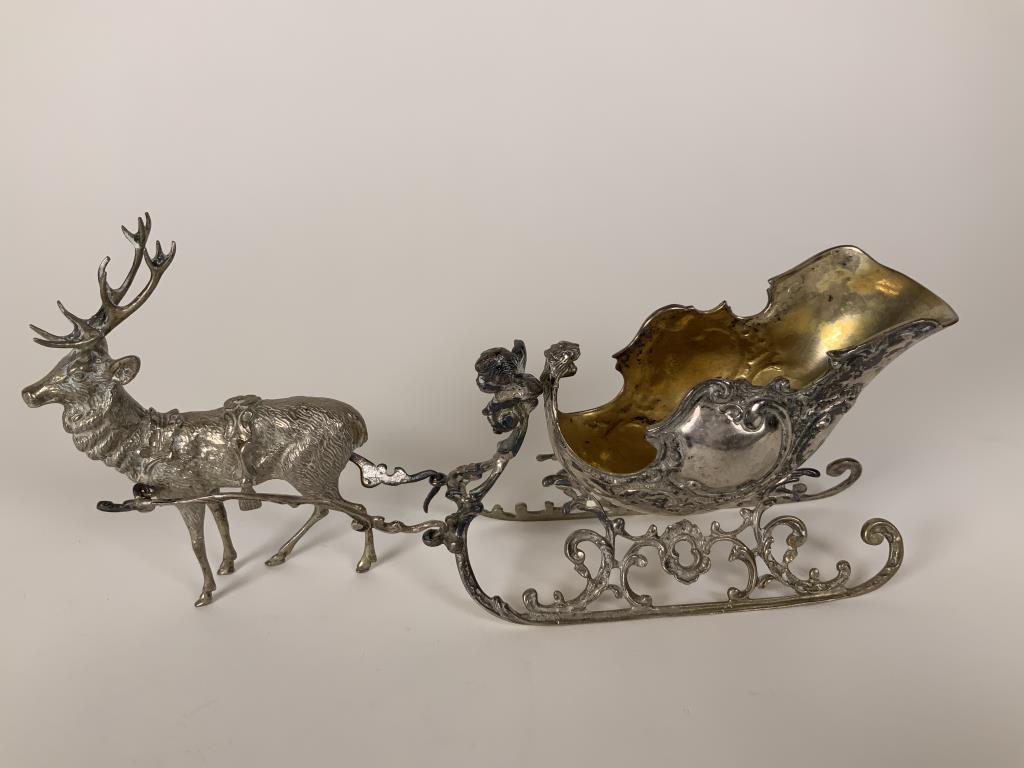 800 Silver Reindeer & Sleigh master salt cellar, reins: cellar, reins are marked, reindeer is 4.25 inches tall, sled is 3.5 inches tall, total length of reindeer and sleigh is 9.5 inches. Total weight of all pieces is 9.51ozt.
