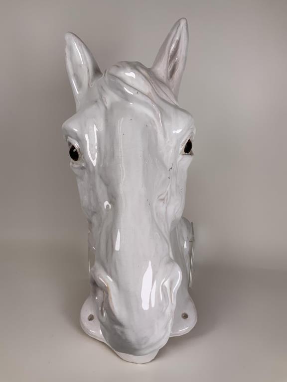 Ceramic Horse Head Trade Sign wall mount ceramic horse: wall mount ceramic horse head, marked on interior R EF361, Made in France. 14 inches tall, 8 inches wide, 15 inches deep from wall. Has wear and repair spots.