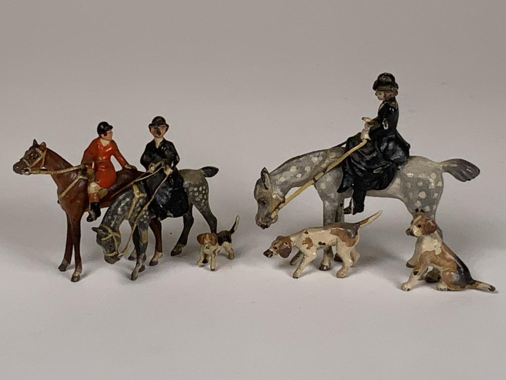2 Cold Painted Austria Bronze figurines side saddle: side saddle rider with dogs, 2.25 inches tall, 2.75 inches long, two riders on horses with dog, 1.75 inches tall, 2.5 inches wide, minor paint loss as seen in photos