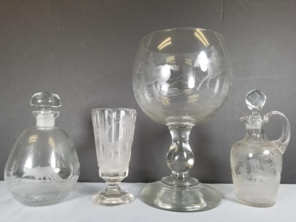 Etched glass goblet, cruet, decanter & glass 10 inch: 10 inch tall goblet has an etched fox hunt equestrian scene. Cruet, has a hound and rabbit scene, it measures 7 inches tall. Decanter has an etched fox scene, it measures 6.5 inches tall. 5.5 inch tal