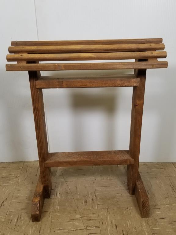 Wooden saddle stand 32 inches tall x 25 inches long x: 32 inches tall x 25 inches long x 16 inches wide at the base
