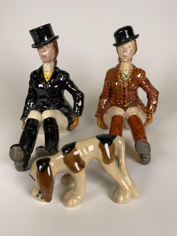 2 Touchstone Mrs. Twittleton deposed figurines and a: and a hound dog figurine. Touchstone Mrs. Twittleton Deposed dated 1950 by B. M. Laughlin, 6 and 6.5 inches tall. Dog is 2 inches tall, 3.75 inches long.