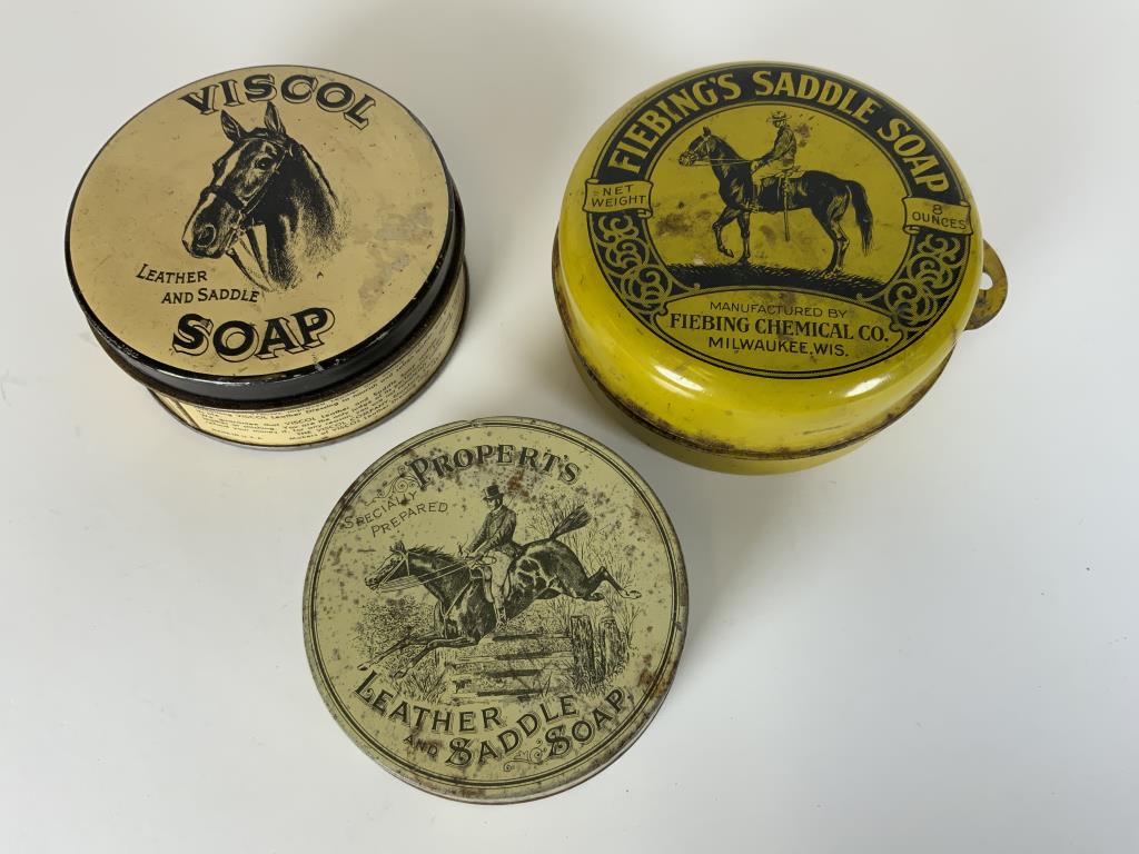 3 Vintage Saddle Soap tins to include Fiebing’s: to include Fiebing’s Yellow tin, Viscol with horse on lid and Propert’s. They are 3.25 - 4.25 inches wide. All are empty.