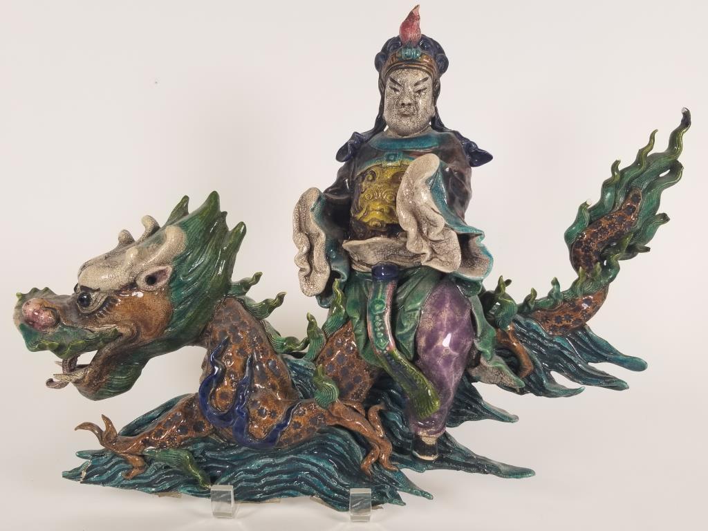 Japanese roof tile, figure of warrior on dragon Enamel: Enamel decorated full body dragon with figure of warrior, 12.5 inches tall x 18 inches long, some minor damage, see photos